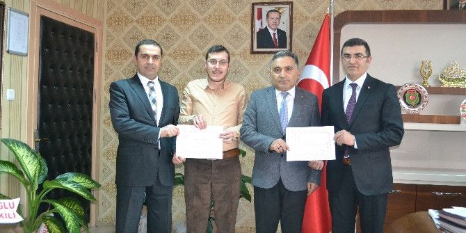 İlbaş’tan Aslan’a Teşekkür Belgesi