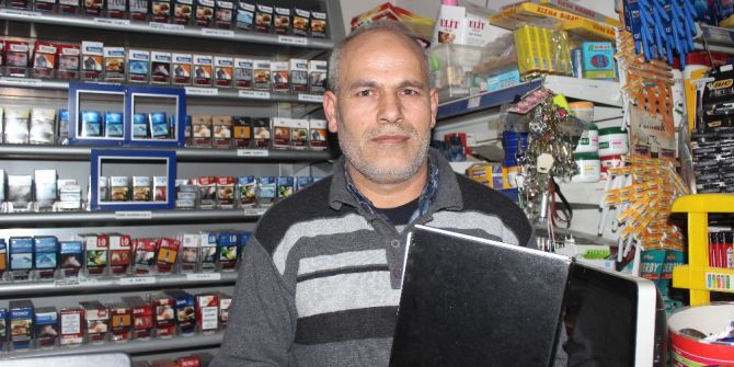 Marketçi Tüfekli Soyguncuyu Veresiye Defteriyle Kovaladı