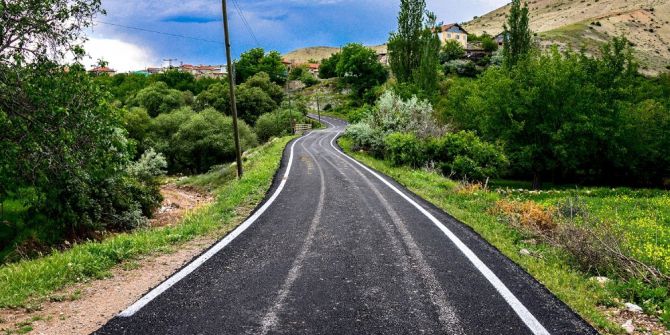 Hekimhan’da 4 Mahallenin Yolu Asfaltlandı