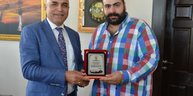 Başkan Korkut’a Berlin Teşkilatından Plaket
