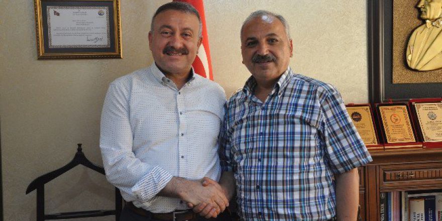 Milletvekili Özkan’dan Esnaf Temsilcisi Dinçer’e Demokrasi Nöbeti Teşekkürü