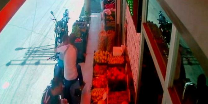 Oğlunu korumaya çalışırken vurulan baba güvenlik kamerasında