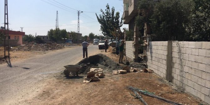 Kamulaştırması biten evlerin duvarları örüldü