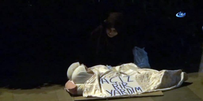 İkiz çocuklarını kullanan dilenci kadının ekip arkadaşı kameraya saldırdı