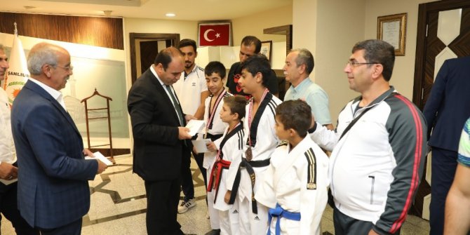 Çiftçi,dereceye giren sporcuları ağırladı