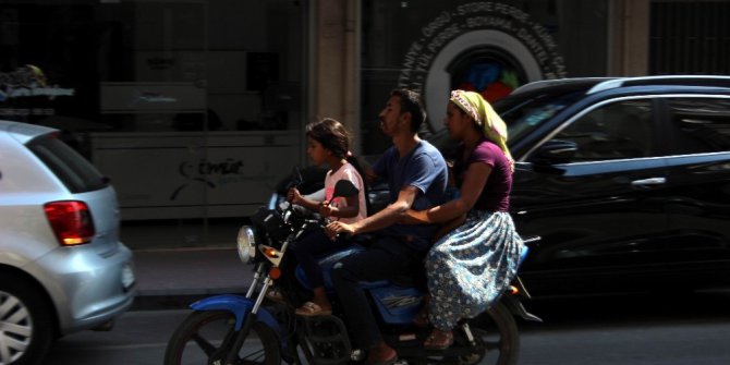 Motosikletle aile boyu şehir turu