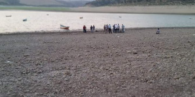 Babasının cansız bedenini baraj gölünden çıkardı