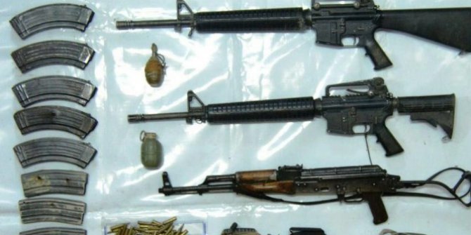 Teröristlerin etkisiz hale getirildiği bölgede silah ve mühimmat ele geçirildi