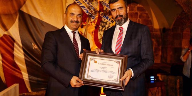 Tayini çıkan kaymakama veda yemeği