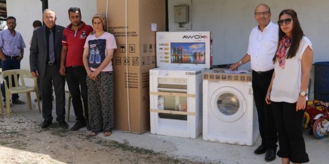 Evi yanan aileye Manisa Büyükşehir’den yardım eli