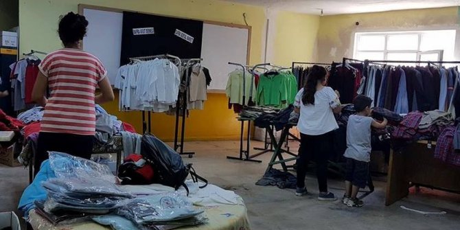 200 öğrenciye okul forması hediye edildi
