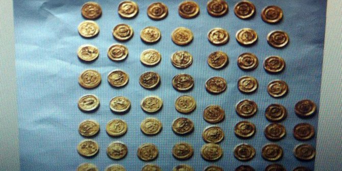 Peçeteden altın sikke çıktı
