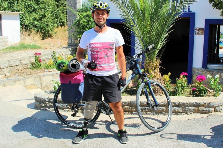 Protez bacağıyla bin kilometre pedal çevirdi