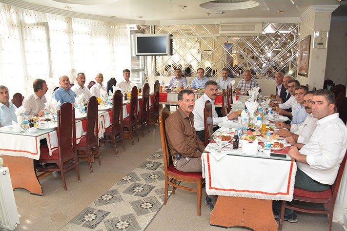 Başkan Epcim muhtarların yemek davetine katıldı